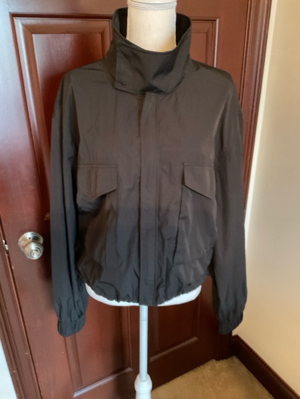 Yogolicious cropped black jacket. Size large.